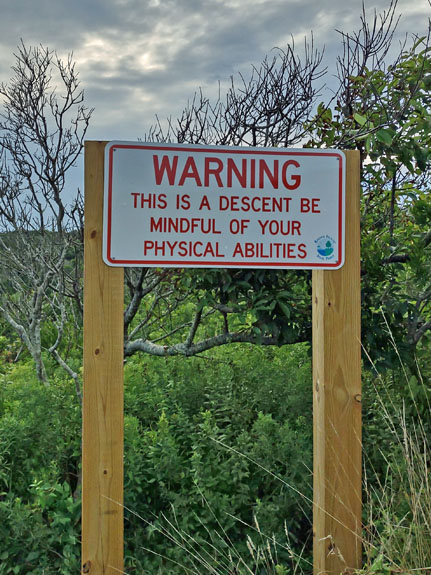 danger sign steep steps Mohegan bluffs overlook Block Island